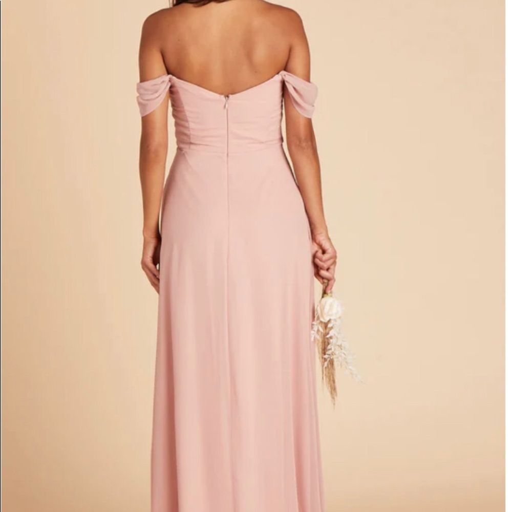 Wore as a bridesmaid. Size XL fits more like a L and added a slit